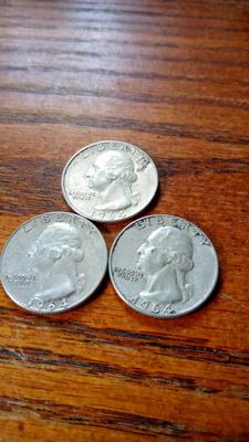 LOT 67 - THREE SILVER WASHINGTON QUARTERS