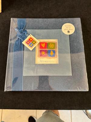 Lot 59. scrapbook organizer and scrapbook