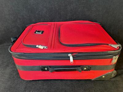 Lot 124. Roller Suitcase