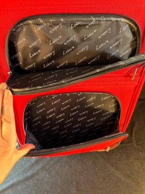 Lot 124. Roller Suitcase