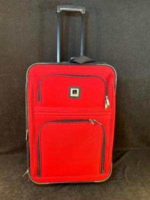 Lot 124. Roller Suitcase