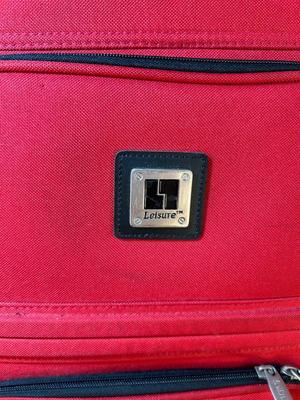 Lot 124. Roller Suitcase