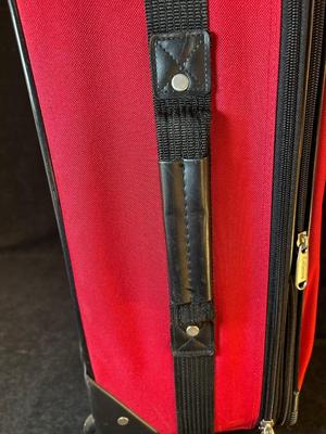 Lot 124. Roller Suitcase