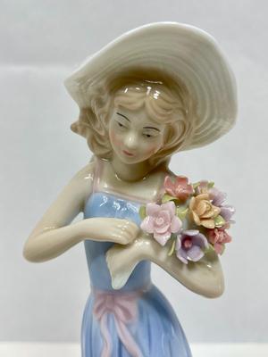 House of Lloyd Porcelain Figurine: Girl with Sun Hat and Flowers