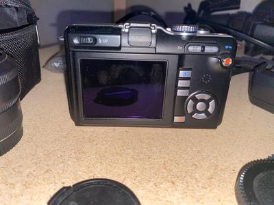 OLYMPUS PEN-E-PL1 DIGITAL CAMERA W/ EXTRA LENS AND TRIPOD