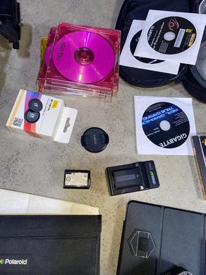 SEVERAL PC GAMES, START-UP DISCS, A PANASONIC CAMERA, TRIPOD AND MORE