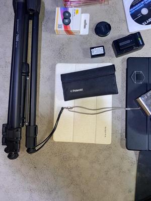 SEVERAL PC GAMES, START-UP DISCS, A PANASONIC CAMERA, TRIPOD AND MORE