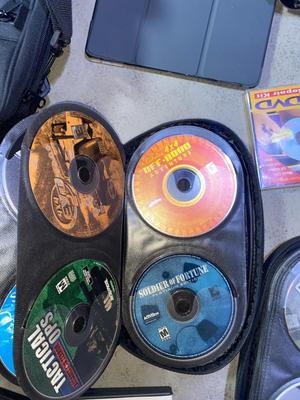 SEVERAL PC GAMES, START-UP DISCS, A PANASONIC CAMERA, TRIPOD AND MORE
