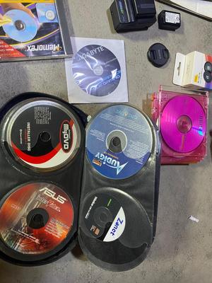SEVERAL PC GAMES, START-UP DISCS, A PANASONIC CAMERA, TRIPOD AND MORE