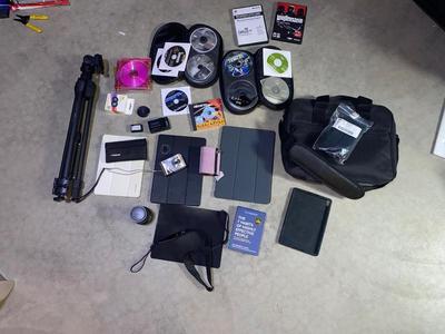 SEVERAL PC GAMES, START-UP DISCS, A PANASONIC CAMERA, TRIPOD AND MORE