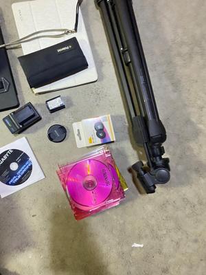 SEVERAL PC GAMES, START-UP DISCS, A PANASONIC CAMERA, TRIPOD AND MORE