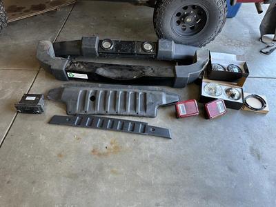 JEEP FRONT AND REAR BUMPERS, HEADLIGHTS, BRAKE LIGHTS AND STOCK RADIO
