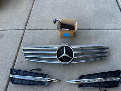 MERCEDES BENZ RADIATOR GRILLE, LED DAYTIME RUNNING LIGHTS AND OEM HID XENON HEADLIGHT BALLASTS