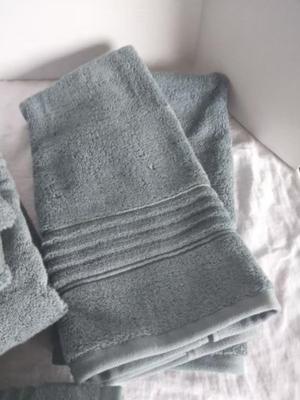TWO SETS OF GREEN TOWELS