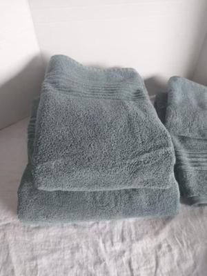 TWO SETS OF GREEN TOWELS