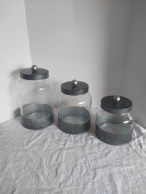 THREE PIECE GLASS CANISTERS WITH LIDS