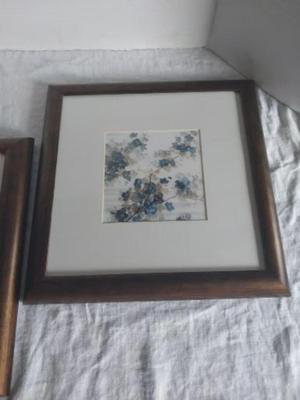 TWO FRAMED WALL HANGINGS