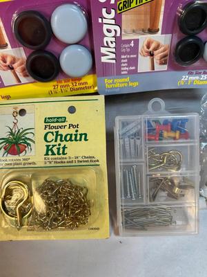 Lot 30. Misc hdwe: chair slides, door bumpers
