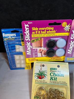 Lot 30. Misc hdwe: chair slides, door bumpers