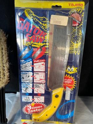 Lot 38. Two Saws, Shop Towels, Wire Brush...
