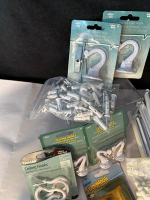 Lot 63. ClosetMaid Parts, Ceiling Hooks and Hanging Racks