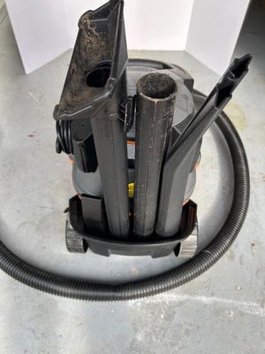 Lot 91. 4 Gal. Wet/Dry Vac and attachments