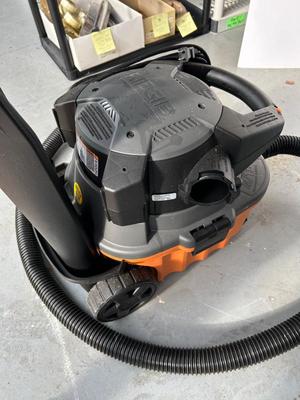Lot 91. 4 Gal. Wet/Dry Vac and attachments