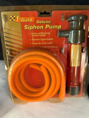 Lot 96. Siphon Pump and Funnels