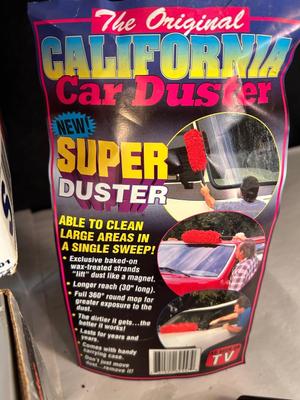 Lot 99. Car Cover, Car Care Products, and Hand Vac