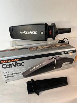 Lot 99. Car Cover, Car Care Products, and Hand Vac