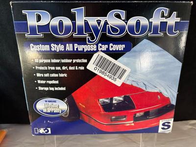 Lot 99. Car Cover, Car Care Products, and Hand Vac