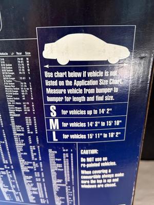 Lot 99. Car Cover, Car Care Products, and Hand Vac