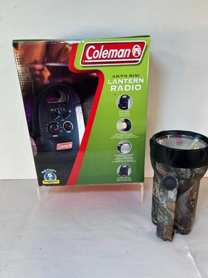 Lot 103. Coleman Lantern/Radio and Flashlight