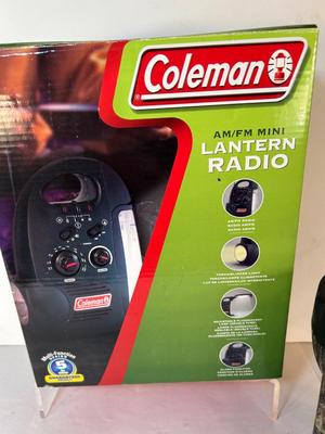 Lot 103. Coleman Lantern/Radio and Flashlight