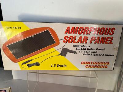 Lot 104. Coleman Lantern, Solar Panel, Air Pump