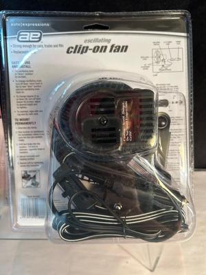 Lot 110. Clip-On Car Fan and New Flashlight