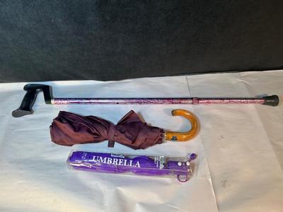 Lot 111. Walking Cane and 2 Umbrellas