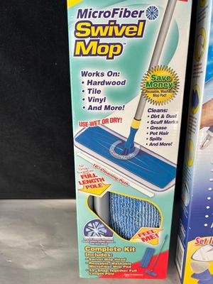 Lot 123. New. Swivel Mop and Glass Wizard