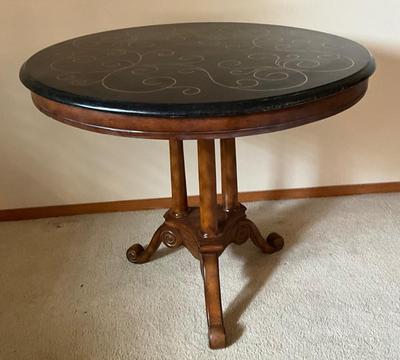 Black lacquered gold embossed round table