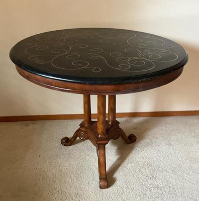 Black lacquered gold embossed round table