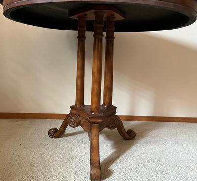 Black lacquered gold embossed round table