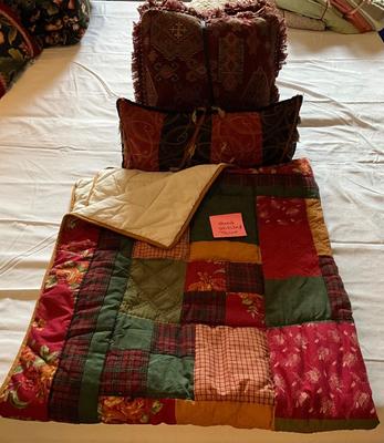 Hand stitched throw with decorative pillows