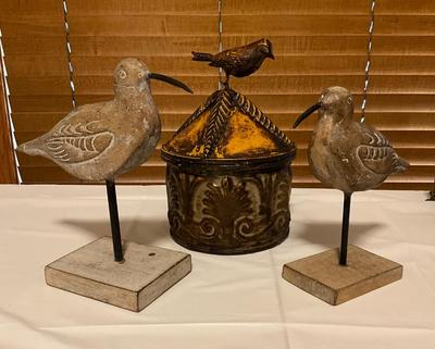 Bird statues and decorative tin