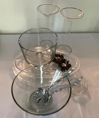 Group of glass items, with silver serving utensils