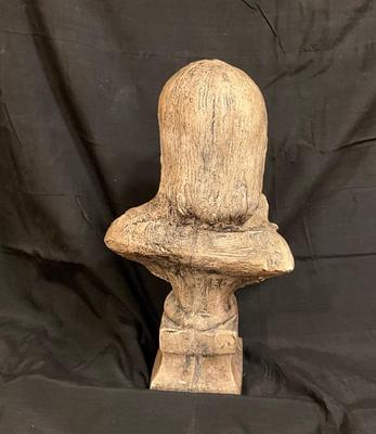 Beautiful young lady statue made of plaster