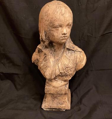 Beautiful young lady statue made of plaster