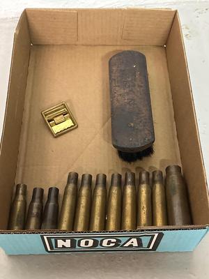 Military Boot brush and used ammunition