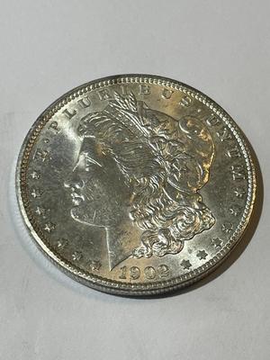 1902-O UNCIRCULATED MS60-62 CONDITION MORGAN SILVER DOLLAR AS PICTURED (COIN #5).