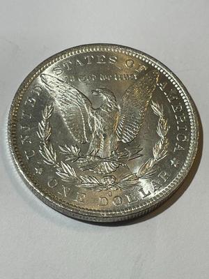 1883-O UNCIRCULATED MS60-62 CONDITION MORGAN SILVER DOLLAR AS PICTURED (COIN #4).