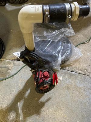 Sump pump and hose